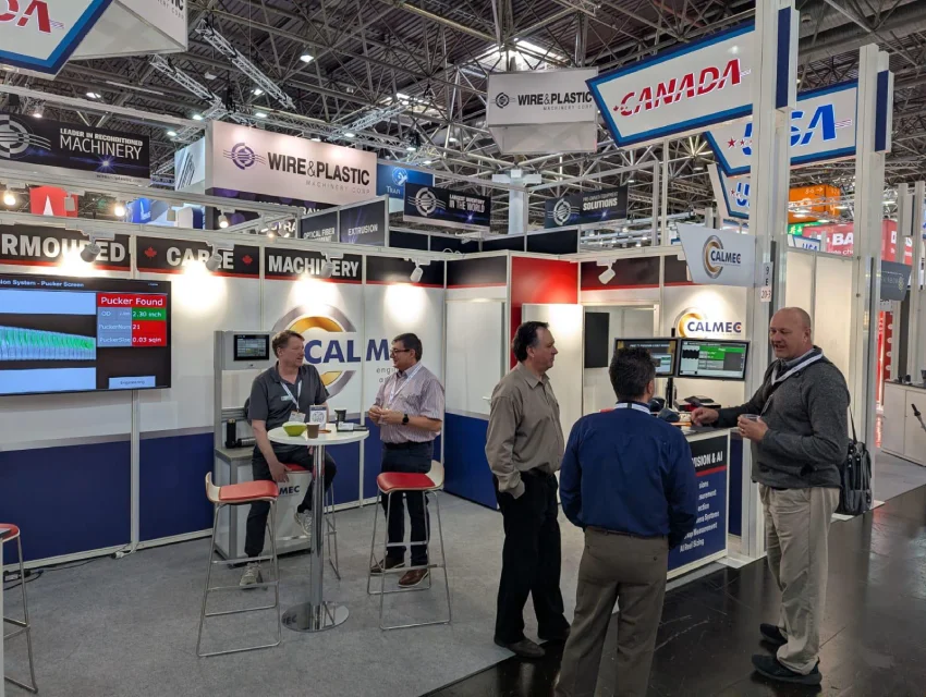 Visitors and manufacturing professionals exploring machine vision and industrial AI technologies